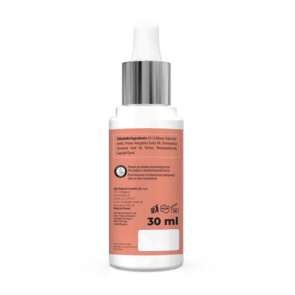Skincare serum bottle with a white cap on a white background