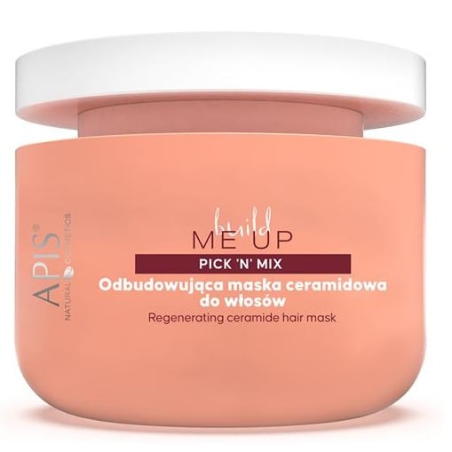 APIS hair mask jar with pink body and white lid on a white background